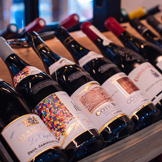 Wine bottles on display at the Auberge du Lyonnais